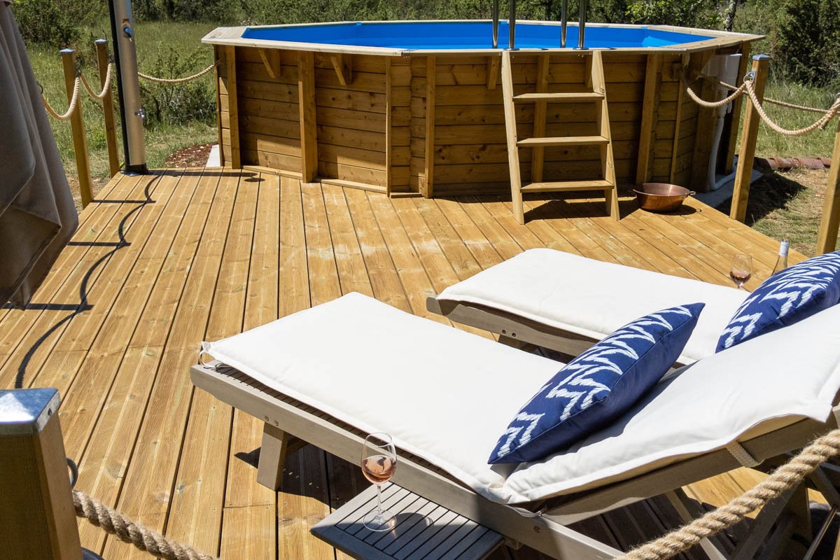 The Secluded Swimming Pool and Sun Deck at Quercy Photo Holidays, Lot, France A Photograph of the Secluded Swimming Pool and Sun Deck at Quercy Photo Holidays, Lot, France